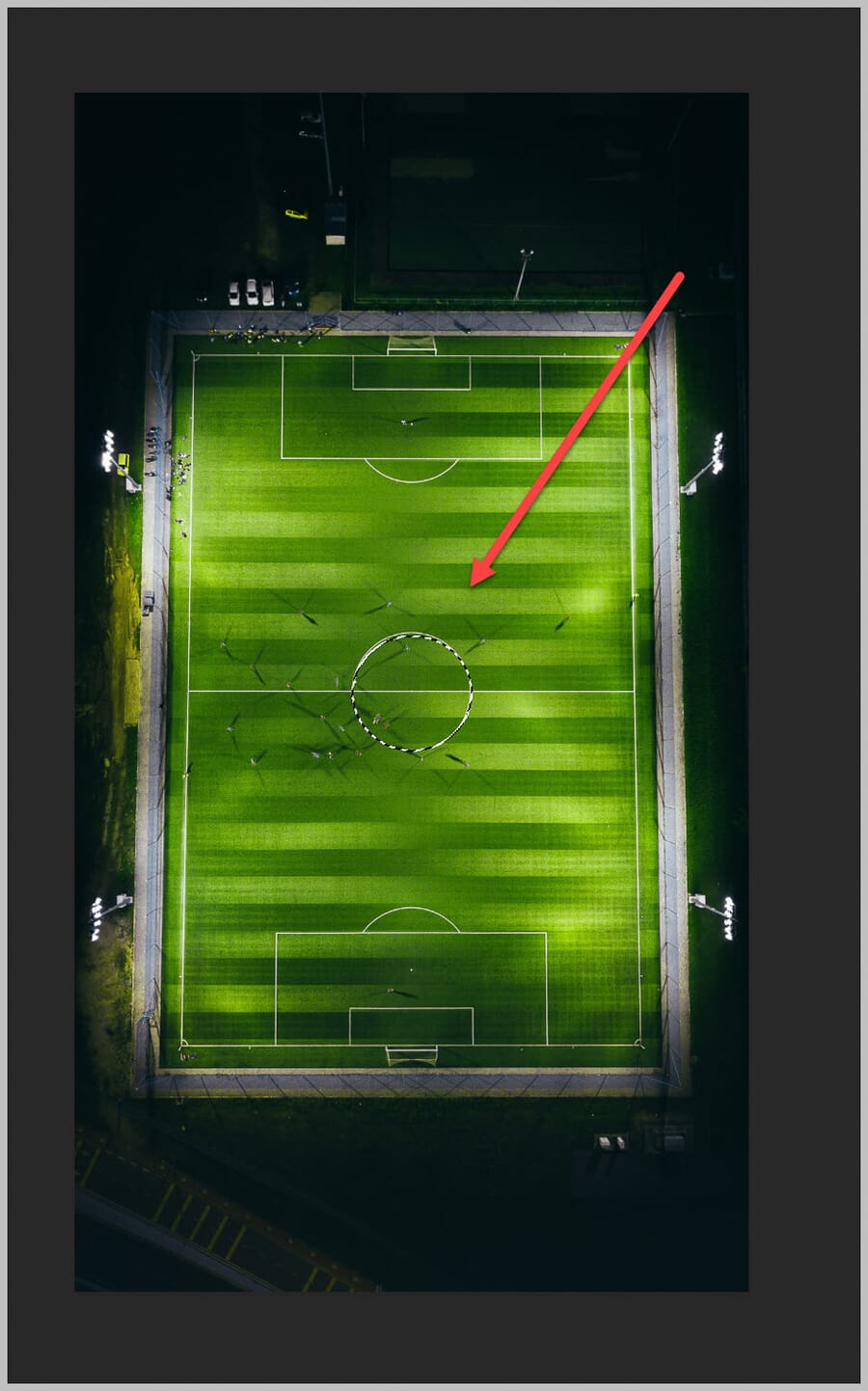 Elliptical selection drawn over the center of a field in Photoshop