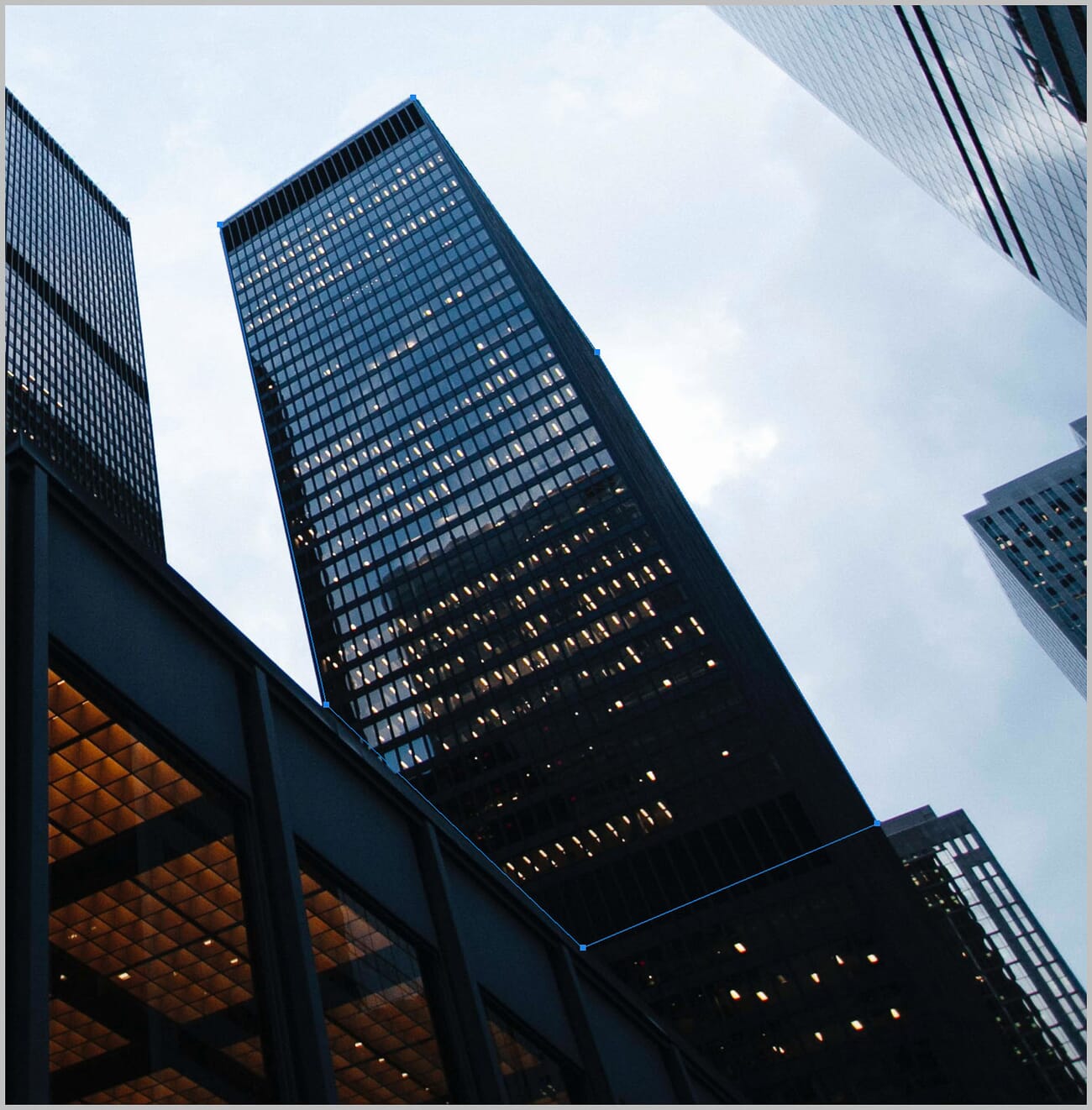 Pen tool path being drawn around a building in Photoshop