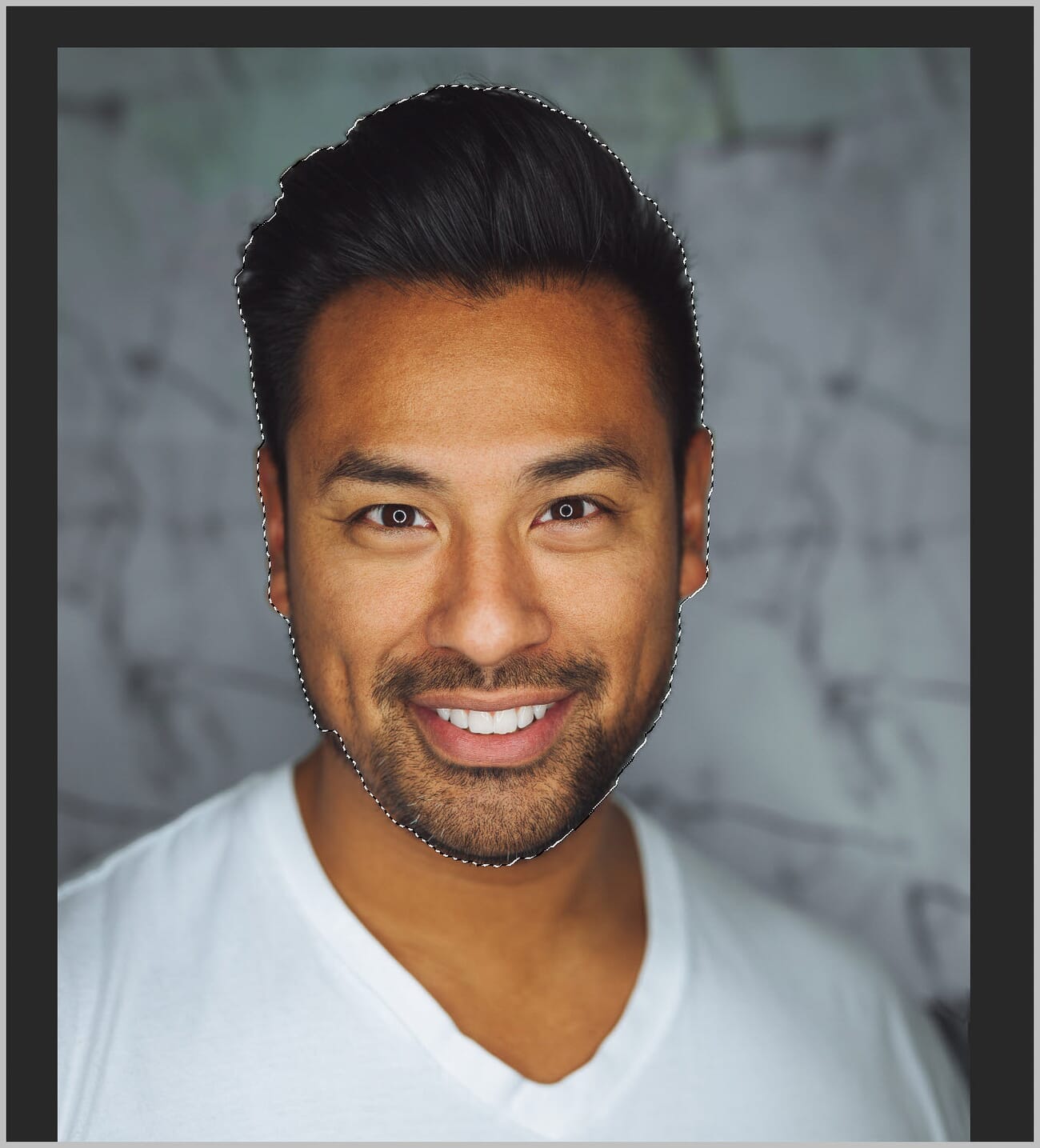 Quick Selection tool being used to select a person's face