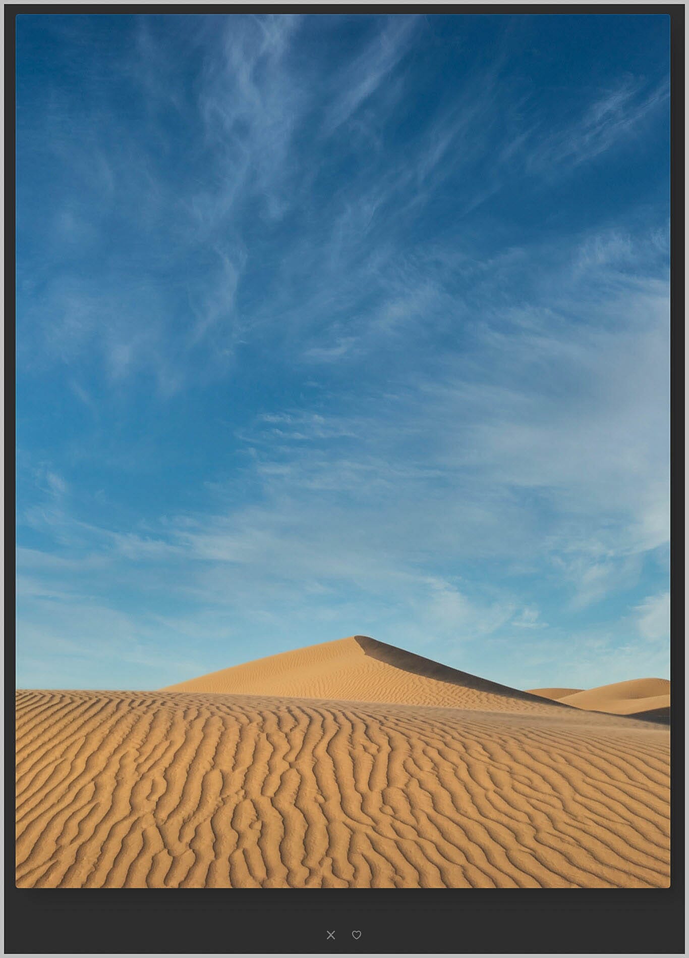 San dune in summer with blue skies