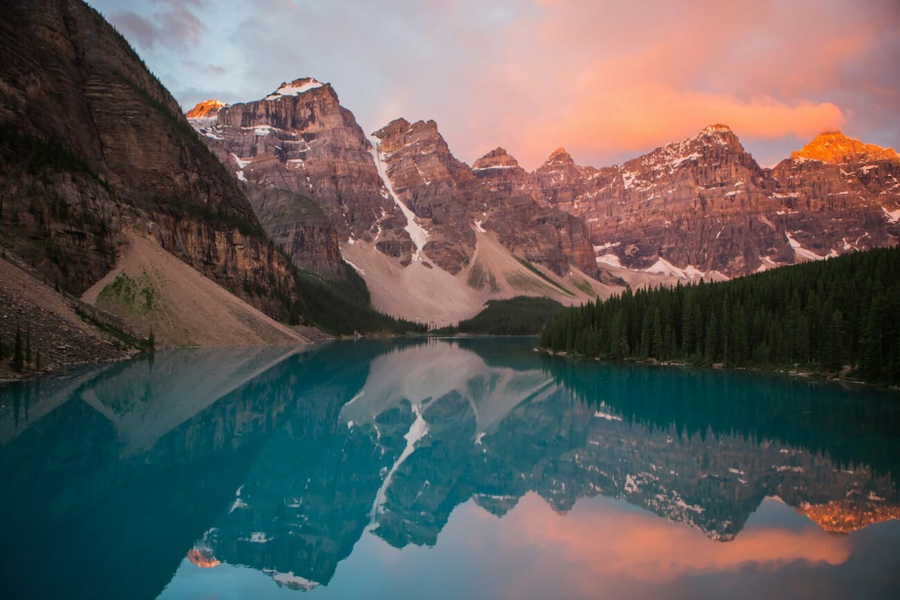 Mountain landscape reflected in a lake - the kind of stunning image available for free on Unsplash