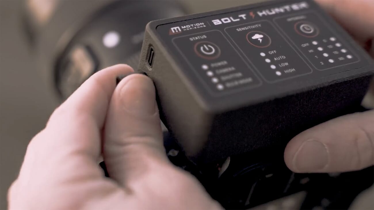 Bolt Hunter lightning trigger mounted on camera in the field during a storm