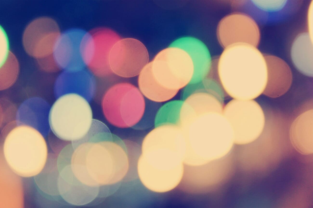 Abstract defocused photograph of blurred colorful lights creating dreamy bokeh
