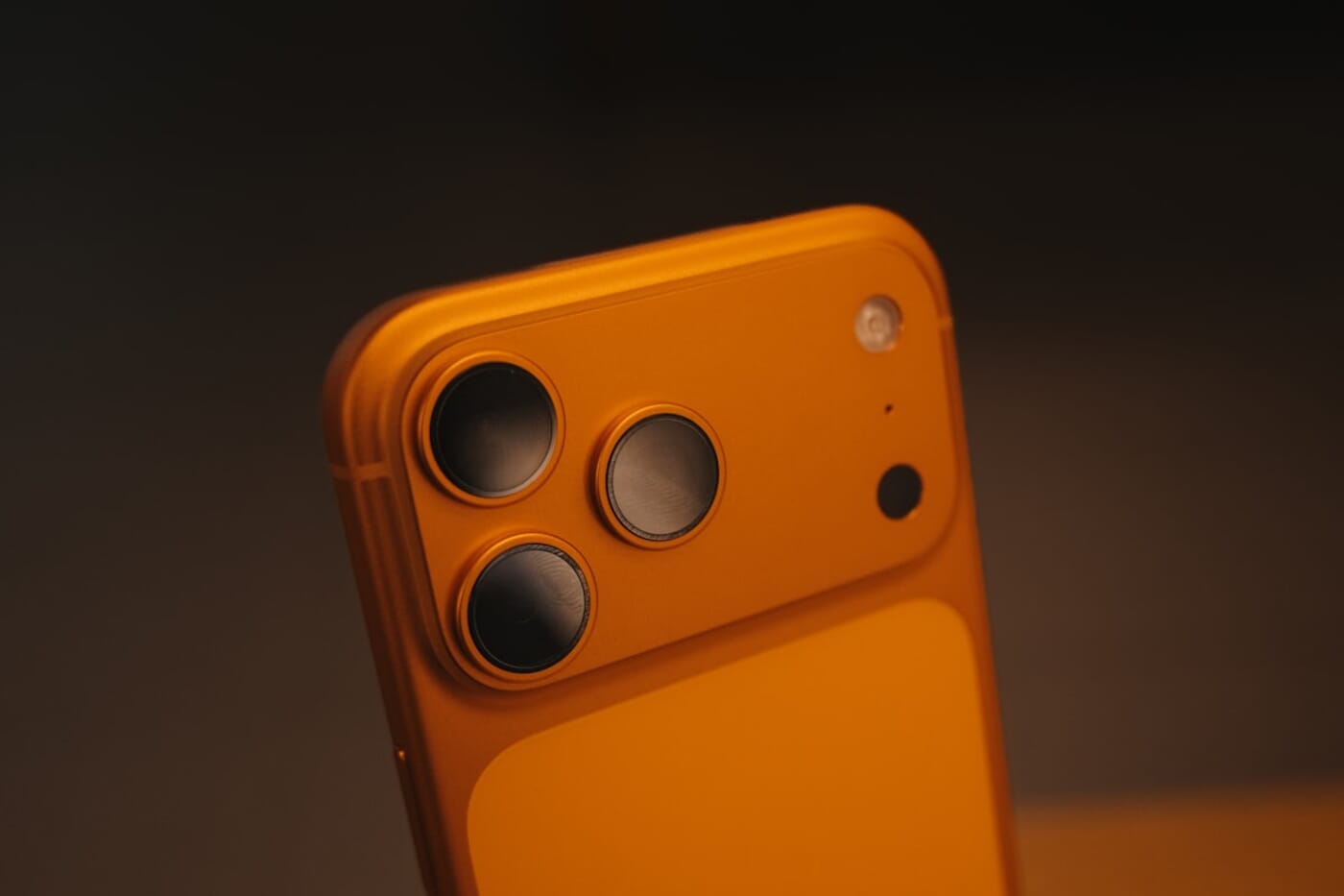 Close-up of iPhone camera module showing the triple-lens system