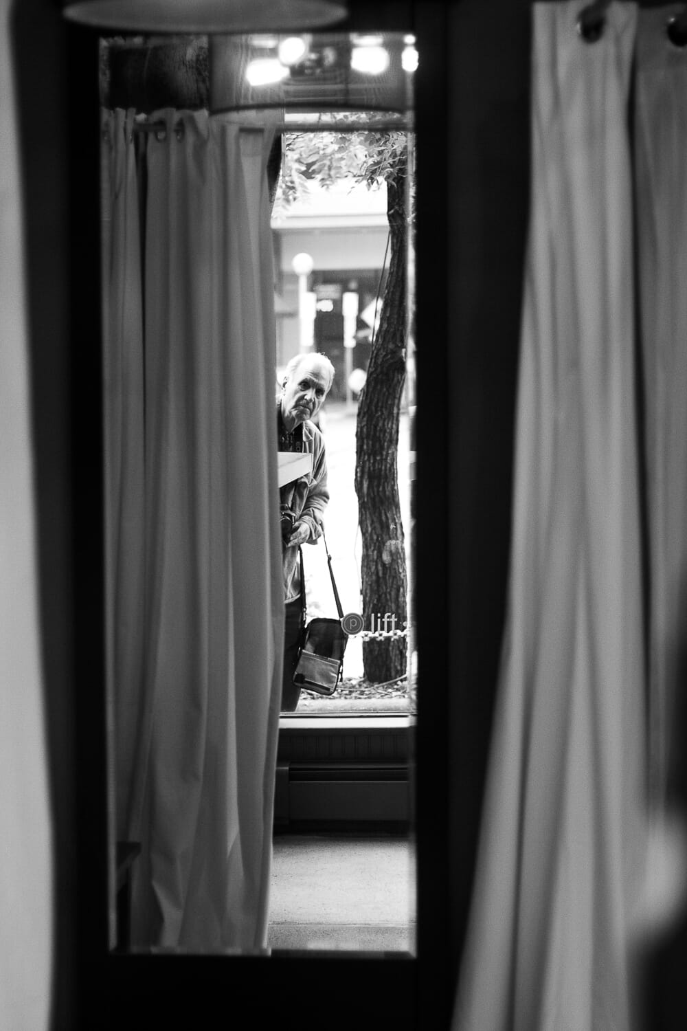 Street photography tends to be much darker and grittier.
