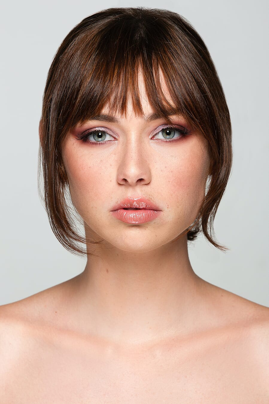 Portrait with butterfly lighting showing symmetrical shadow beneath nose