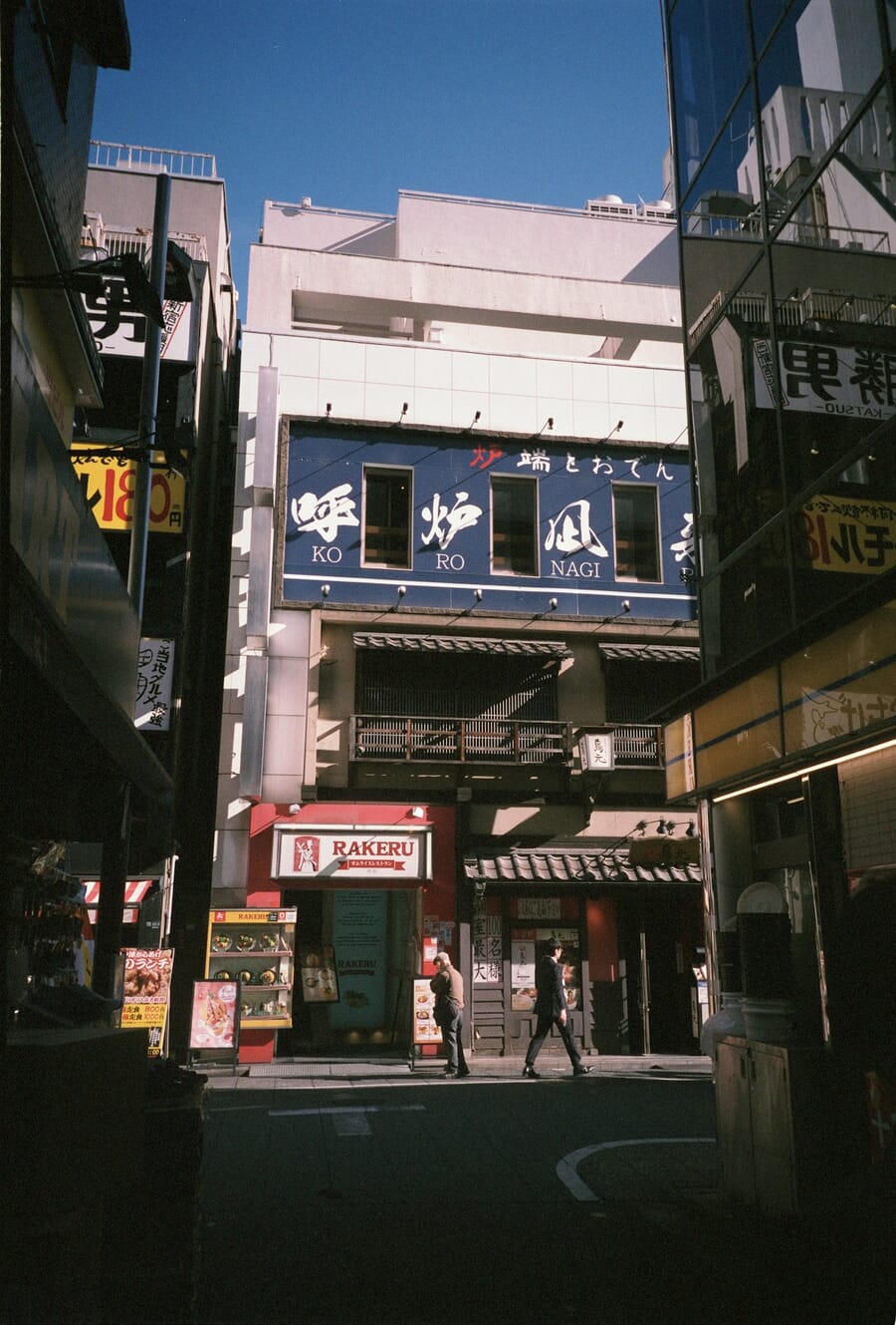 Tokyo alley with vibrant signage — shot on Minolta TC-1