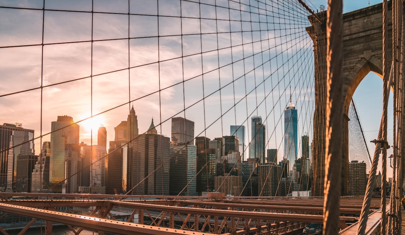 Golden-hour light through the Brooklyn Bridge cables
