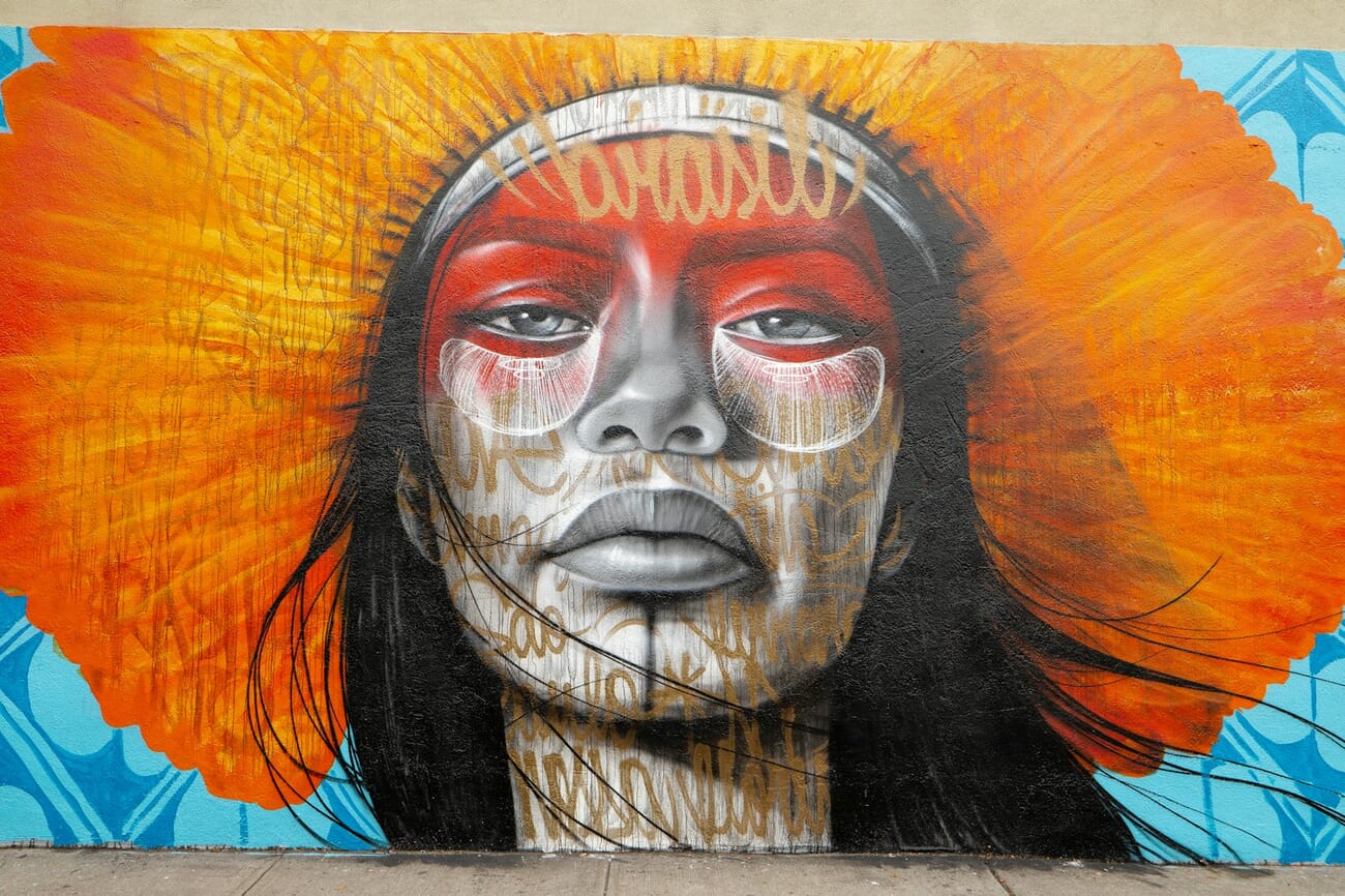 A large street-art mural on a SoHo wall in Manhattan