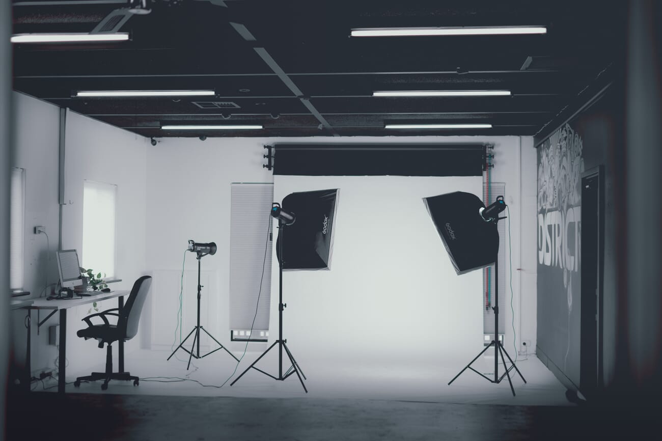 Softboxes diffusing studio lights for painting reproduction