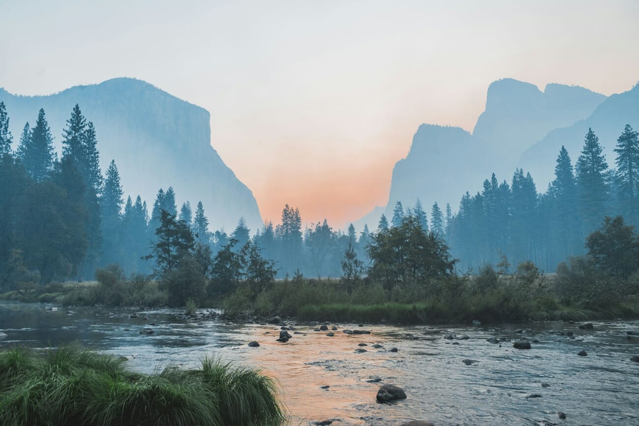 Yosemite Valley at sunset, the entire valley floor and distant peaks in continuous sharp focus, shot at f/11.0 · 1/60 · ISO 800