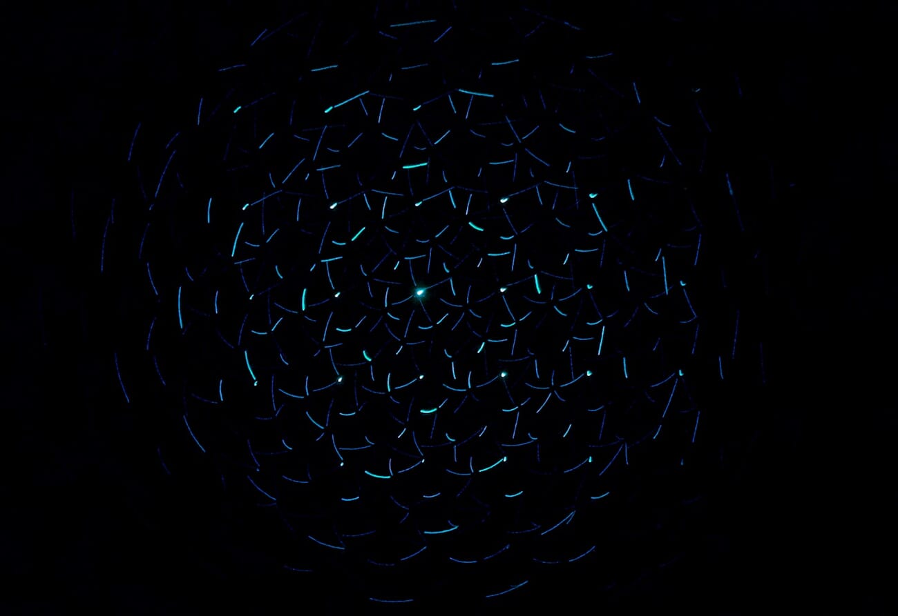 Long exposure light trails creating a galaxy-like pattern