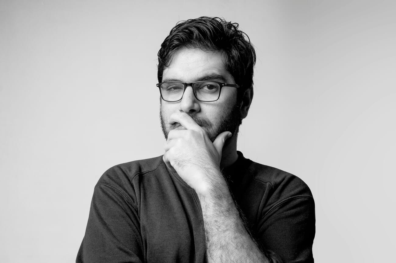 Portrait showing deep emotion through shadow and light contrast