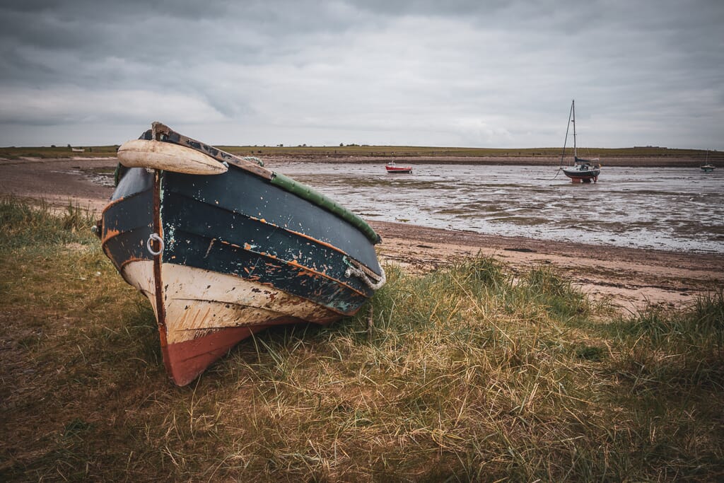 A retro edit of a seaside boat image