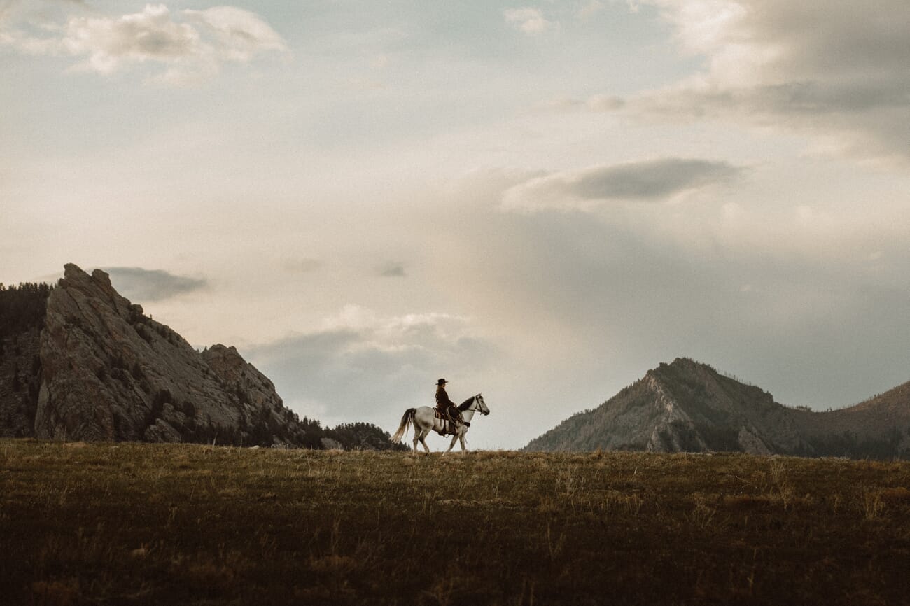 Western-themed cowboy portrait at a ranch