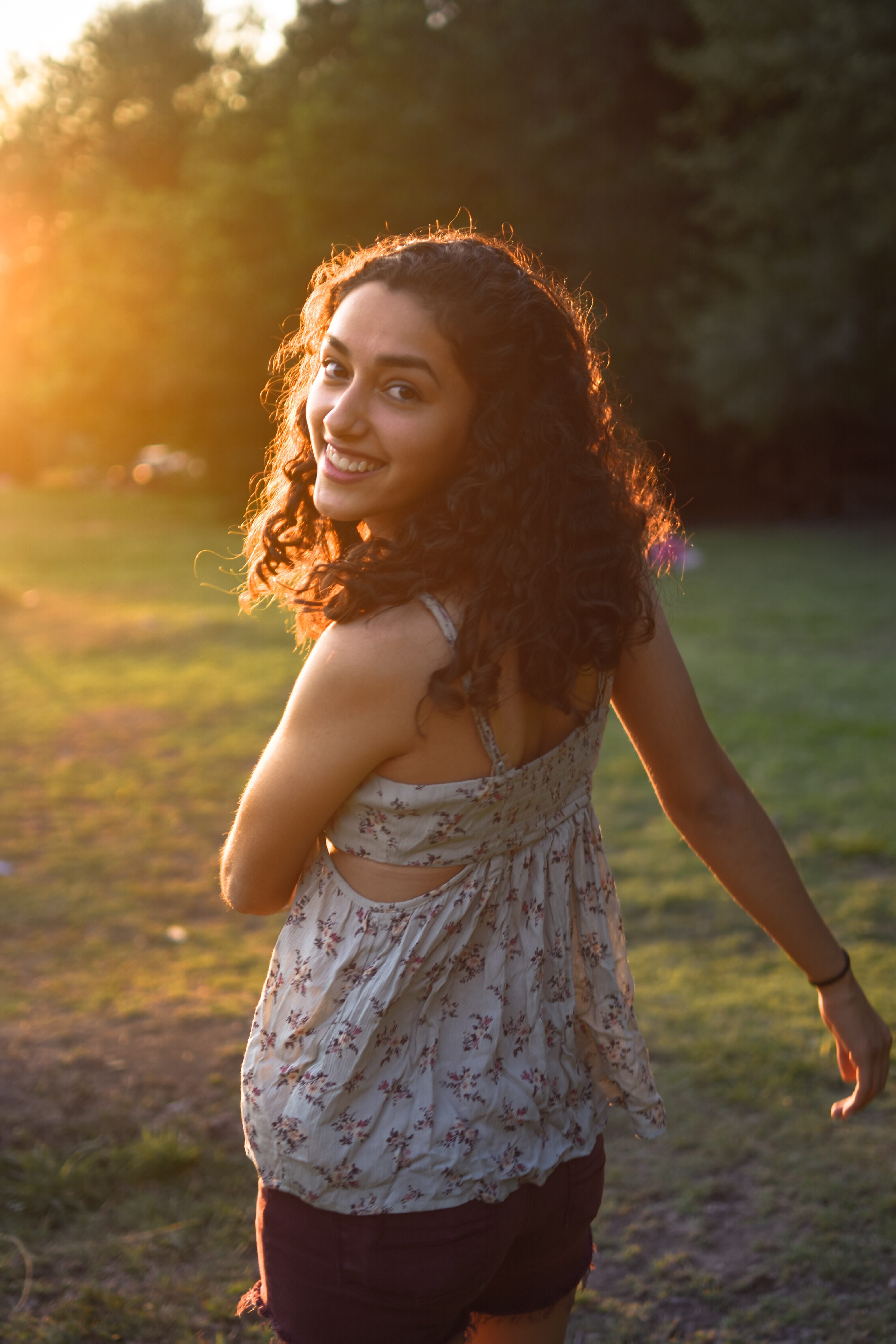 The golden light reminds us of the warmth of motherhood.