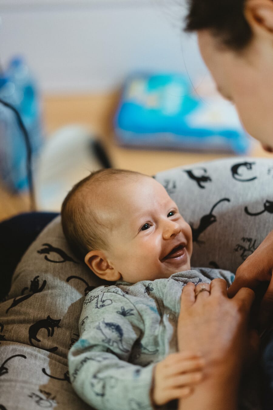 Newborn photoshoot idea at home: In Laughter