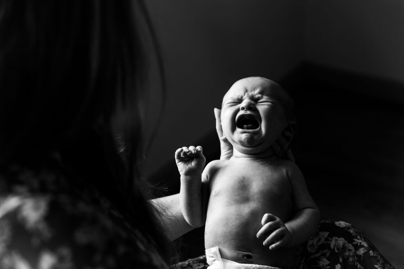 Newborn photoshoot idea at home: In Tears