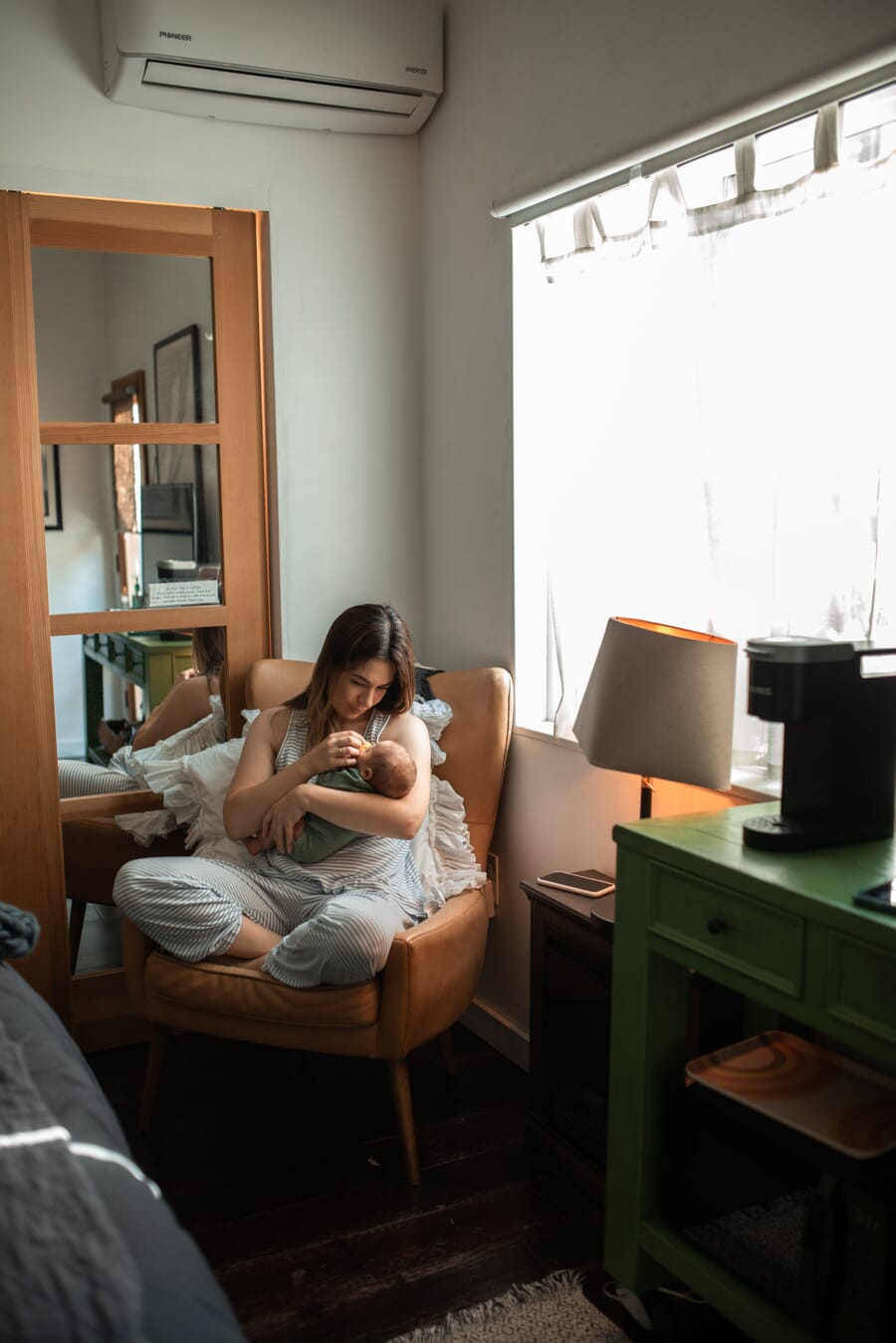 Newborn photoshoot idea at home: On a Nursing Chair