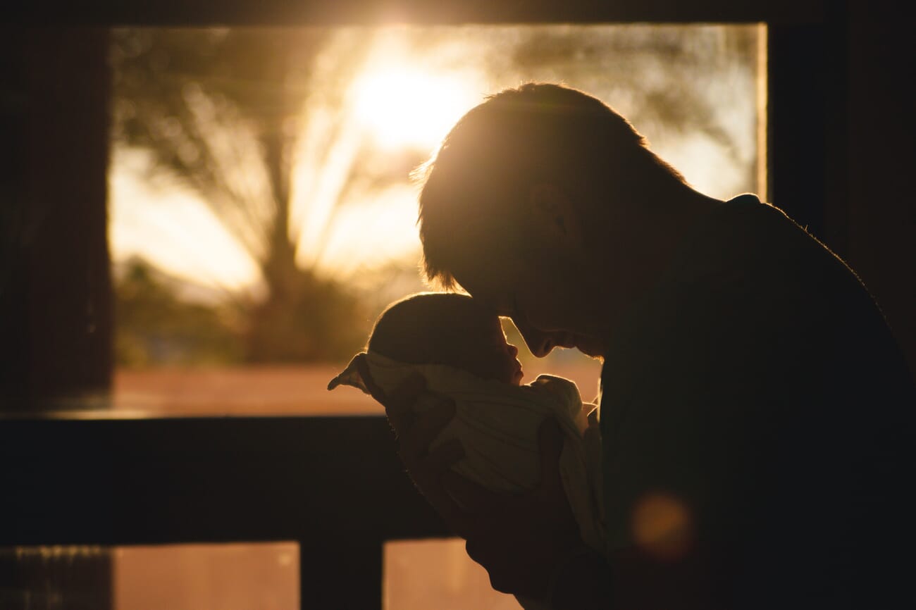 Newborn photoshoot idea at home: In Front of a Sunset Window