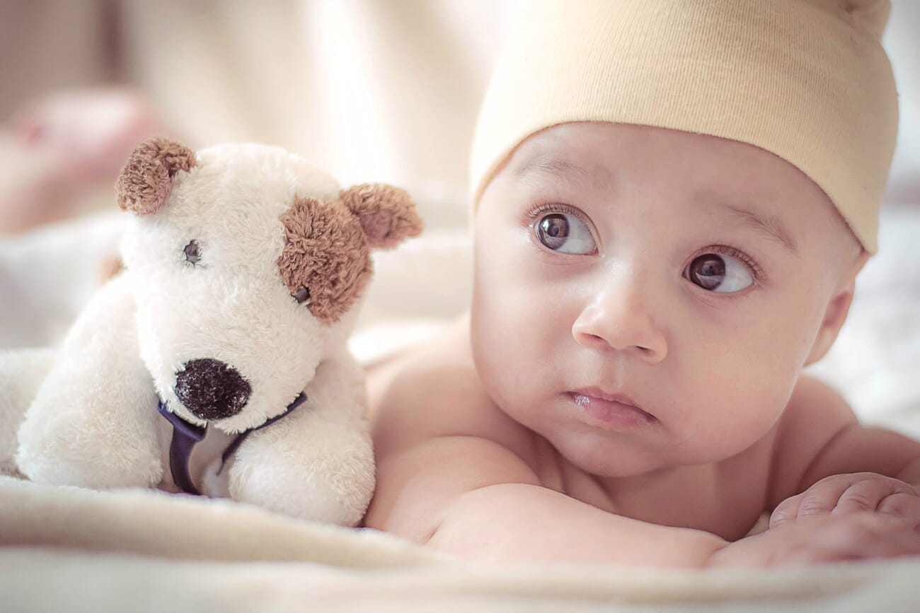 Newborn photoshoot idea at home: A Beloved Toy