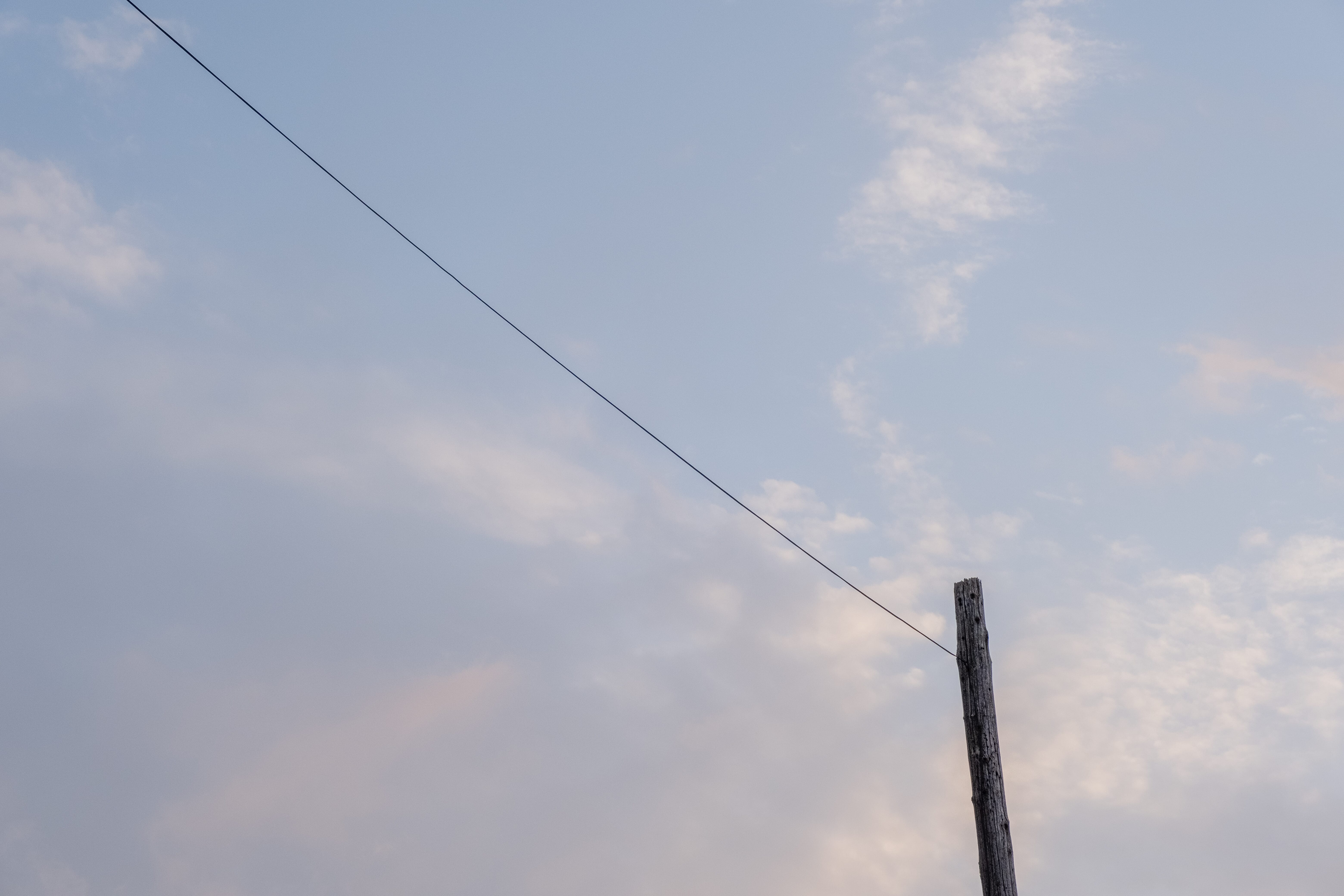 telephone pole at sunset