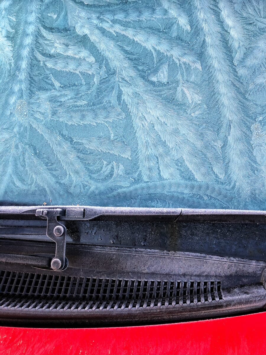 Abstract category winner 2026 iPhone Photography Awards, frost patterns on a car windshield by Barry Mayes
