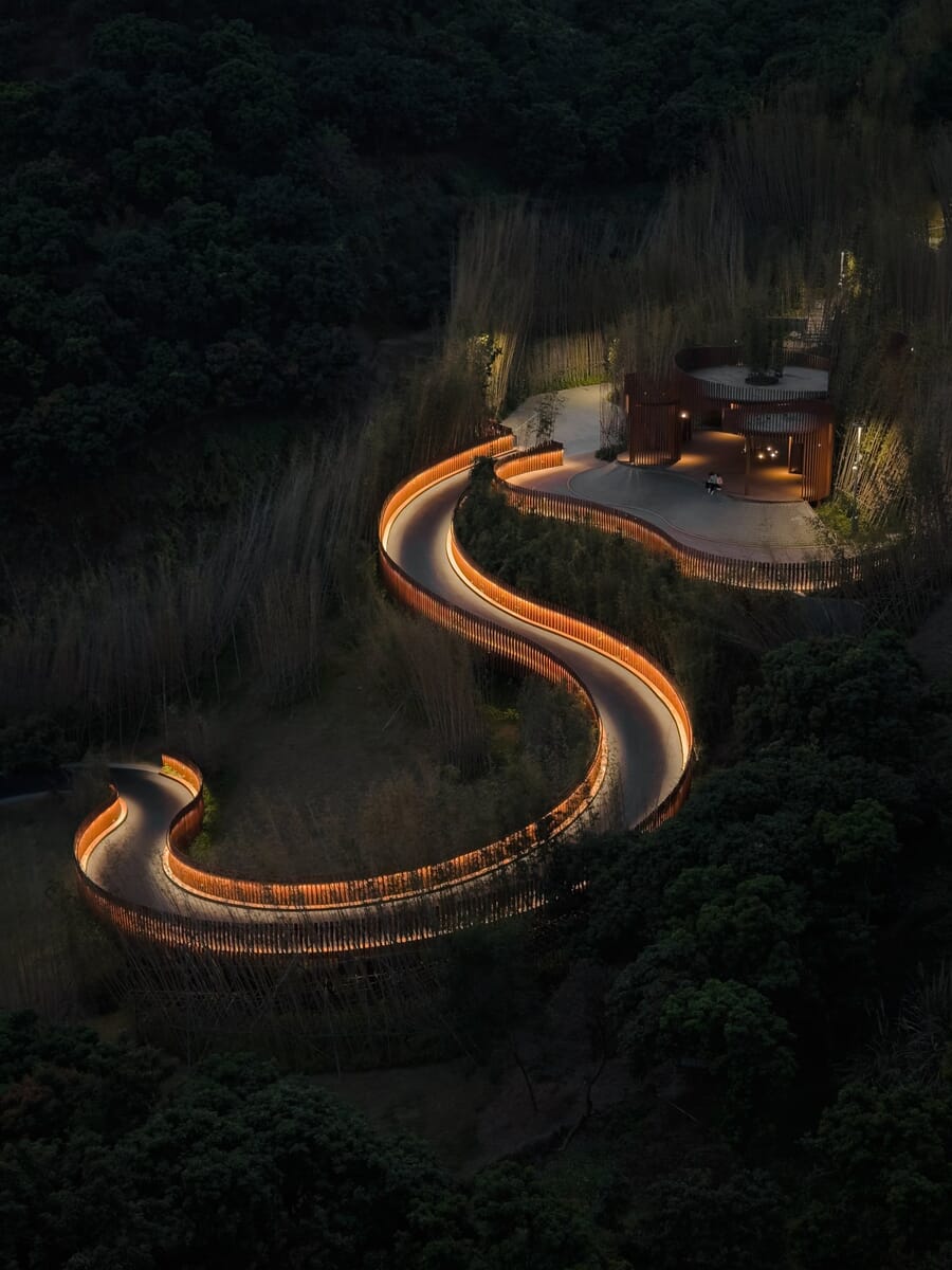Architecture category winner, an illuminated S-curve road leading to a building at dusk by Ziwen Chen