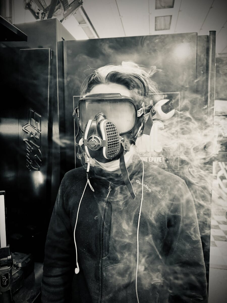 Portrait category winner, a masked figure wreathed in smoke titled To Go Up In Smoke by Brice Picard