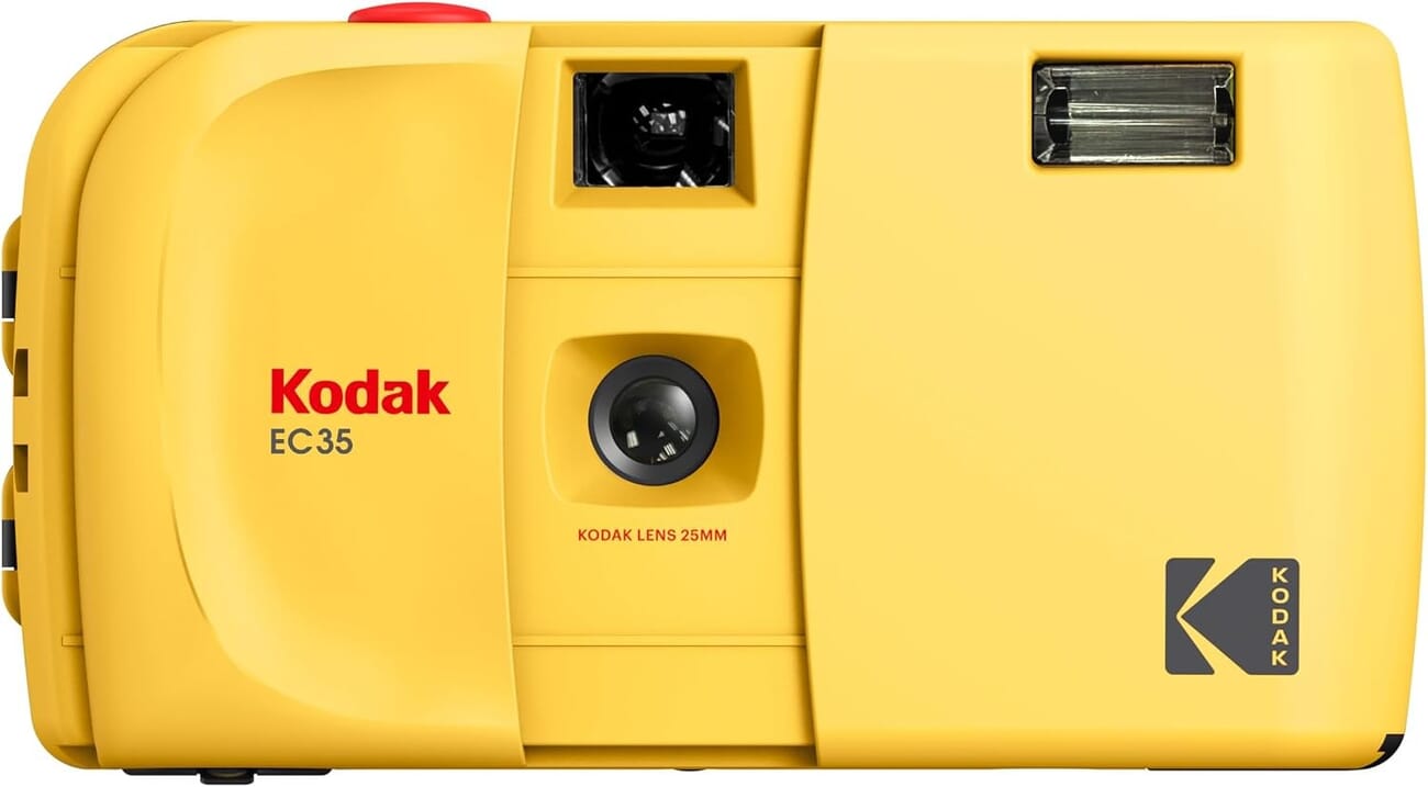 Kodak EC35 reusable 35mm film camera in Kodak yellow, front view showing the 25mm lens and built-in flash