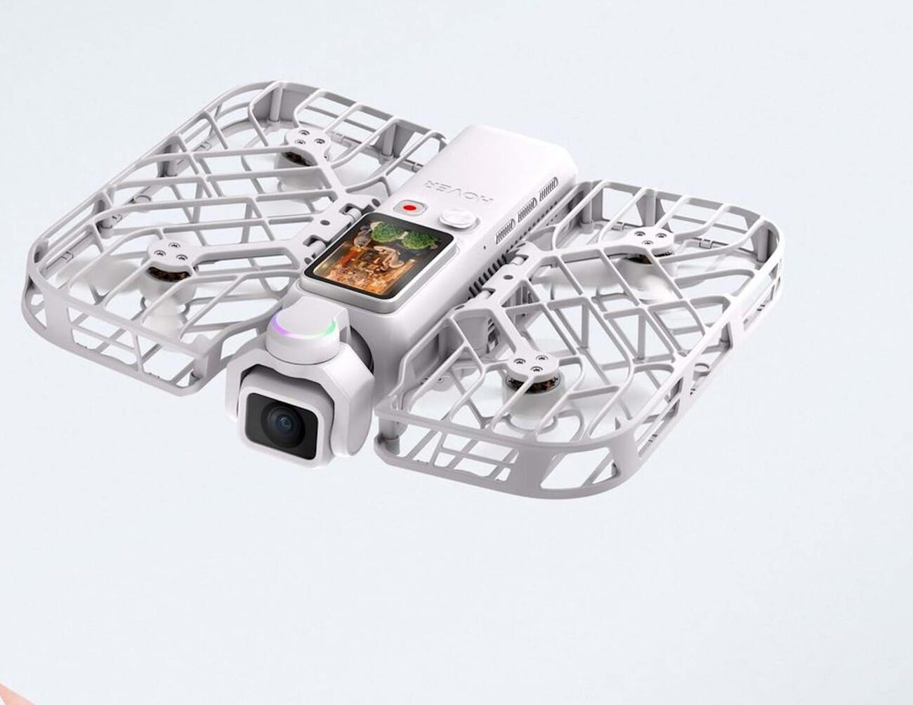 HoverAir Versa in drone mode with the camera module docked in its caged rotor body