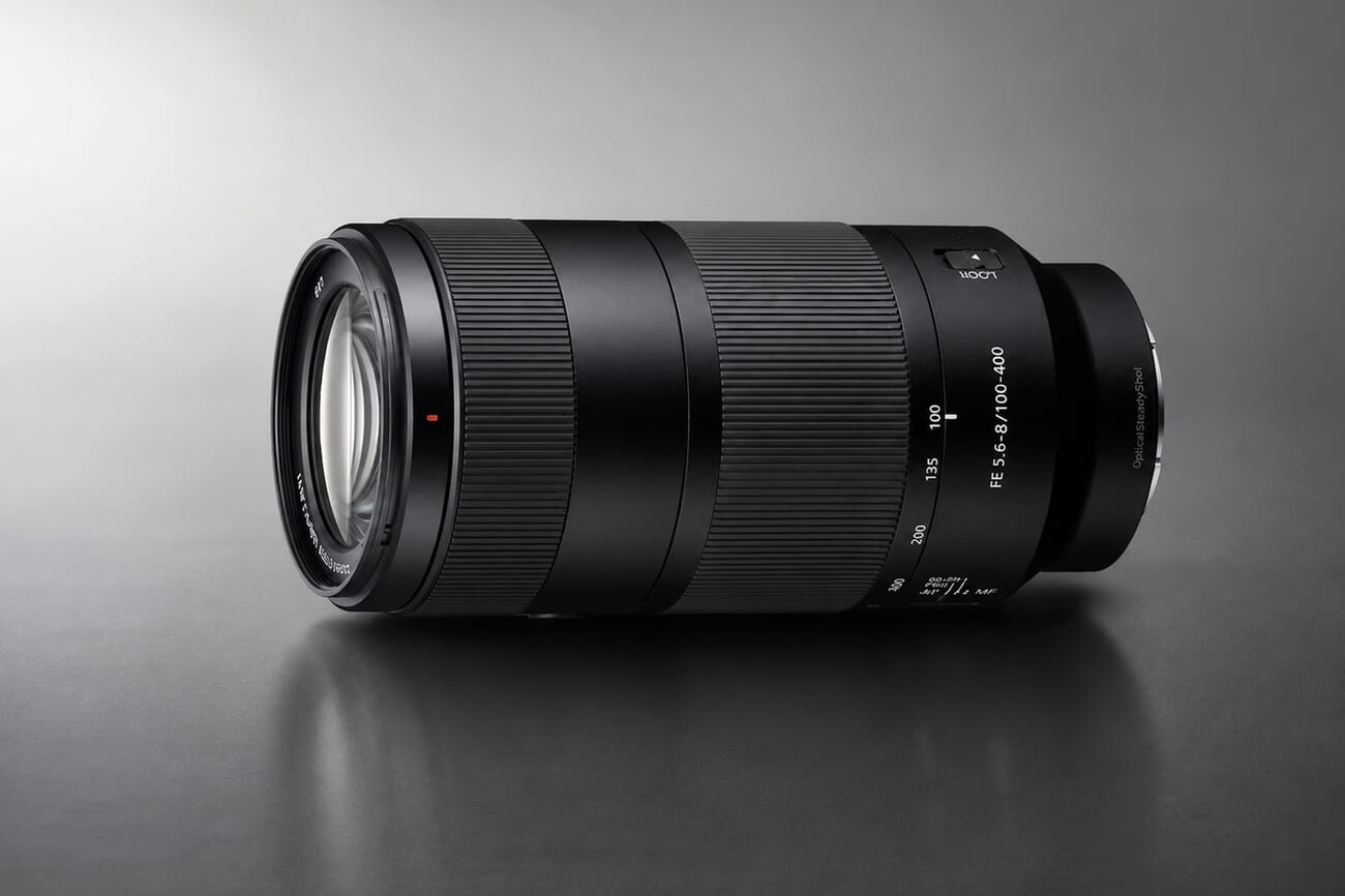 Sony FE 100-400mm f/5.6-8 OSS super-telephoto zoom lens studio product shot