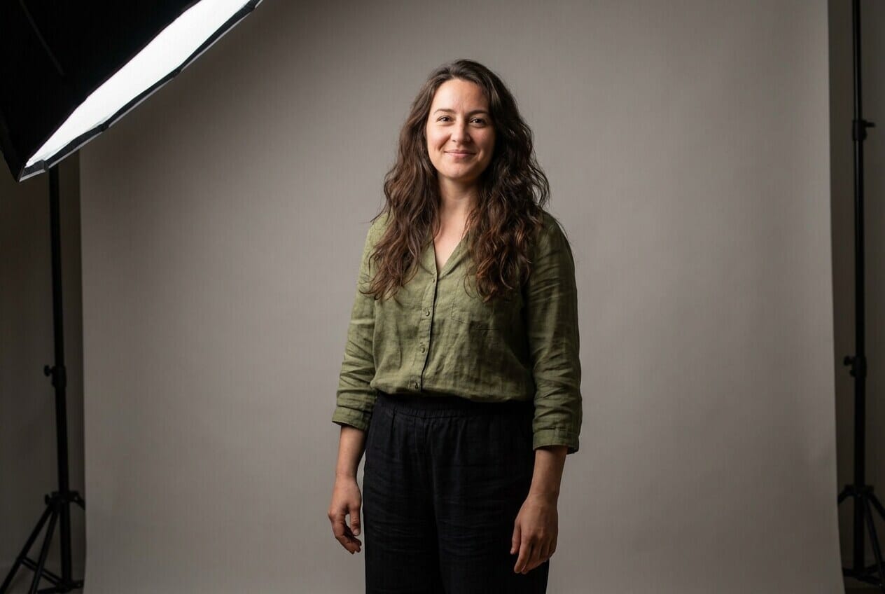 Woman standing with natural relaxed joint positions