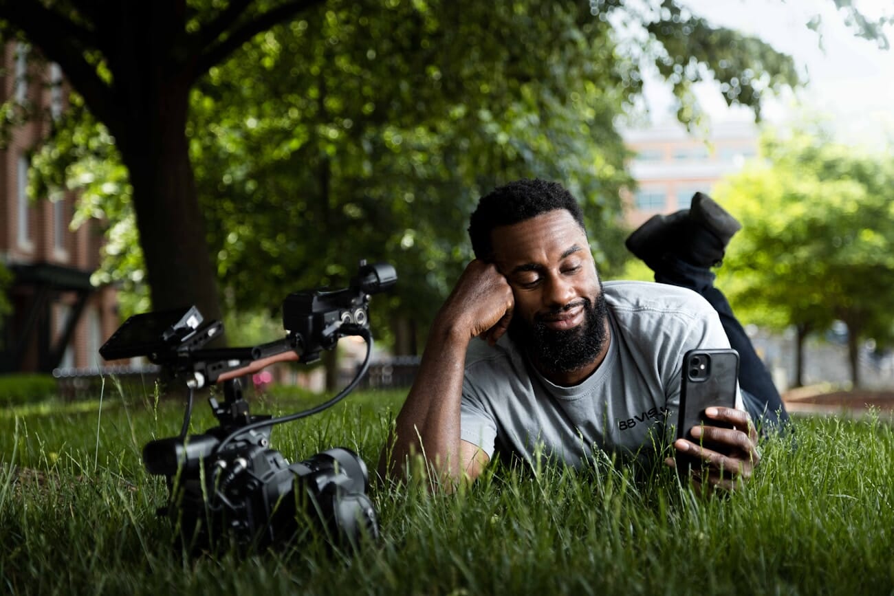 Content creator at a park captured on Canon EOS RP at 80mm