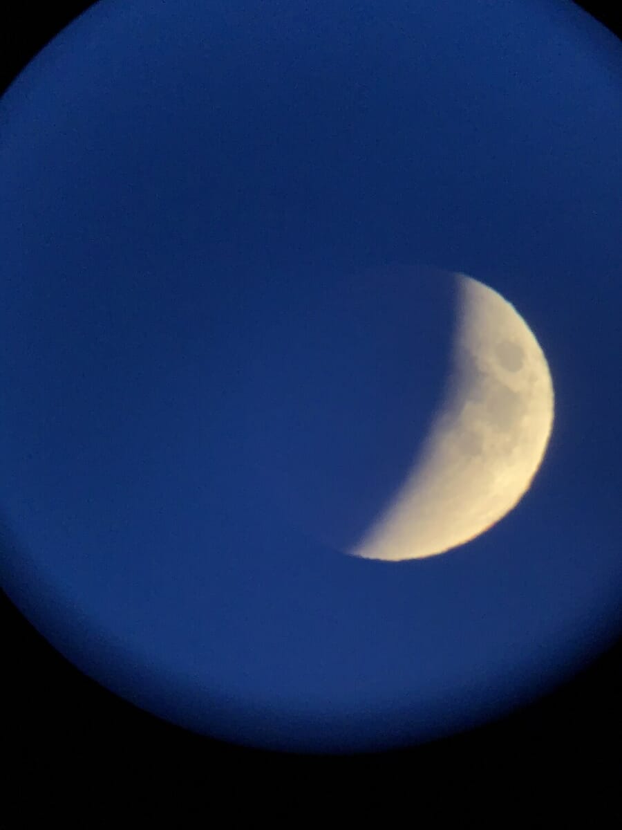 Rare selenelion eclipse with Moon and Sun both visible from Halls Harbour Nova Scotia