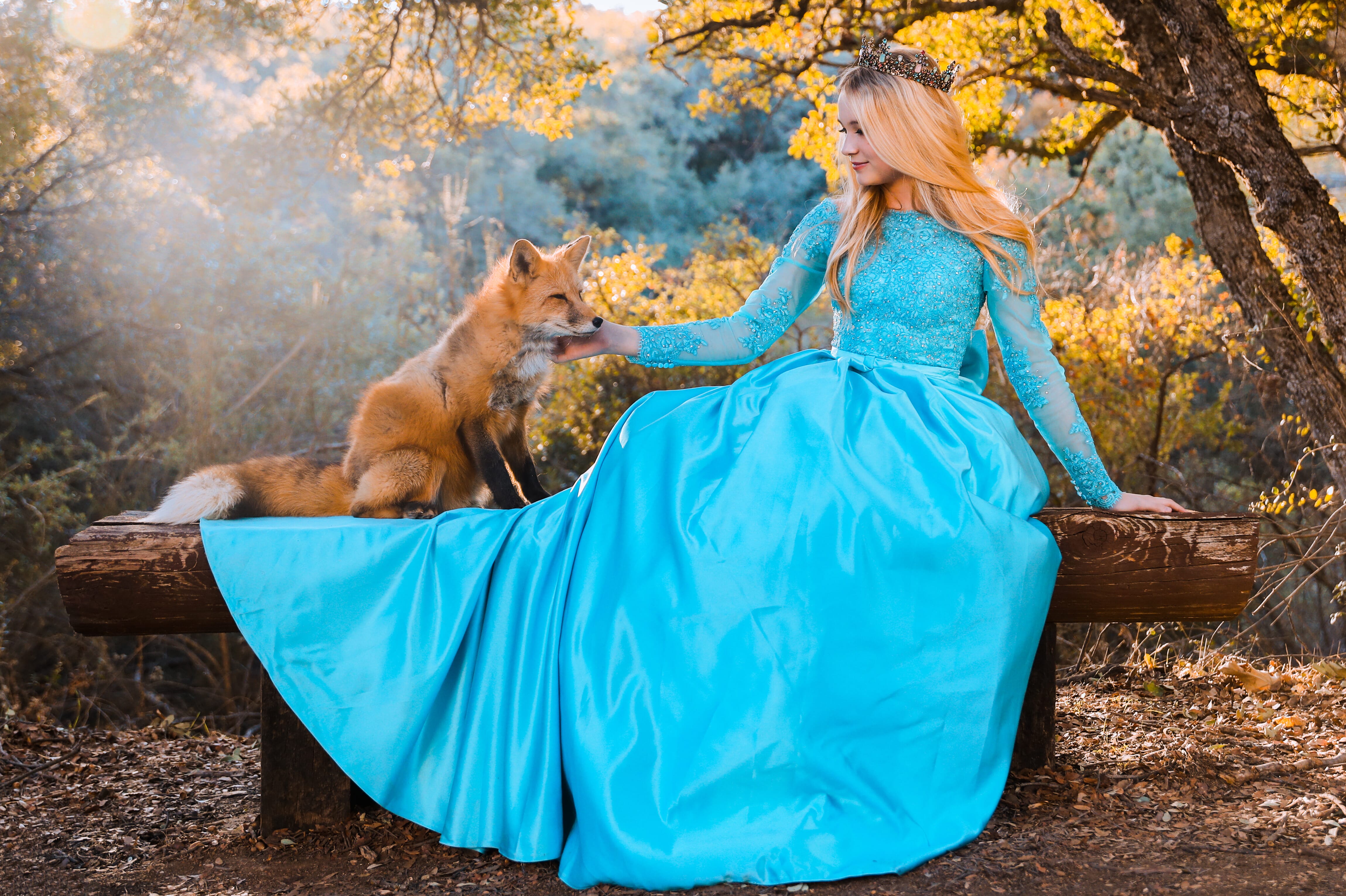 Model posing with a fox