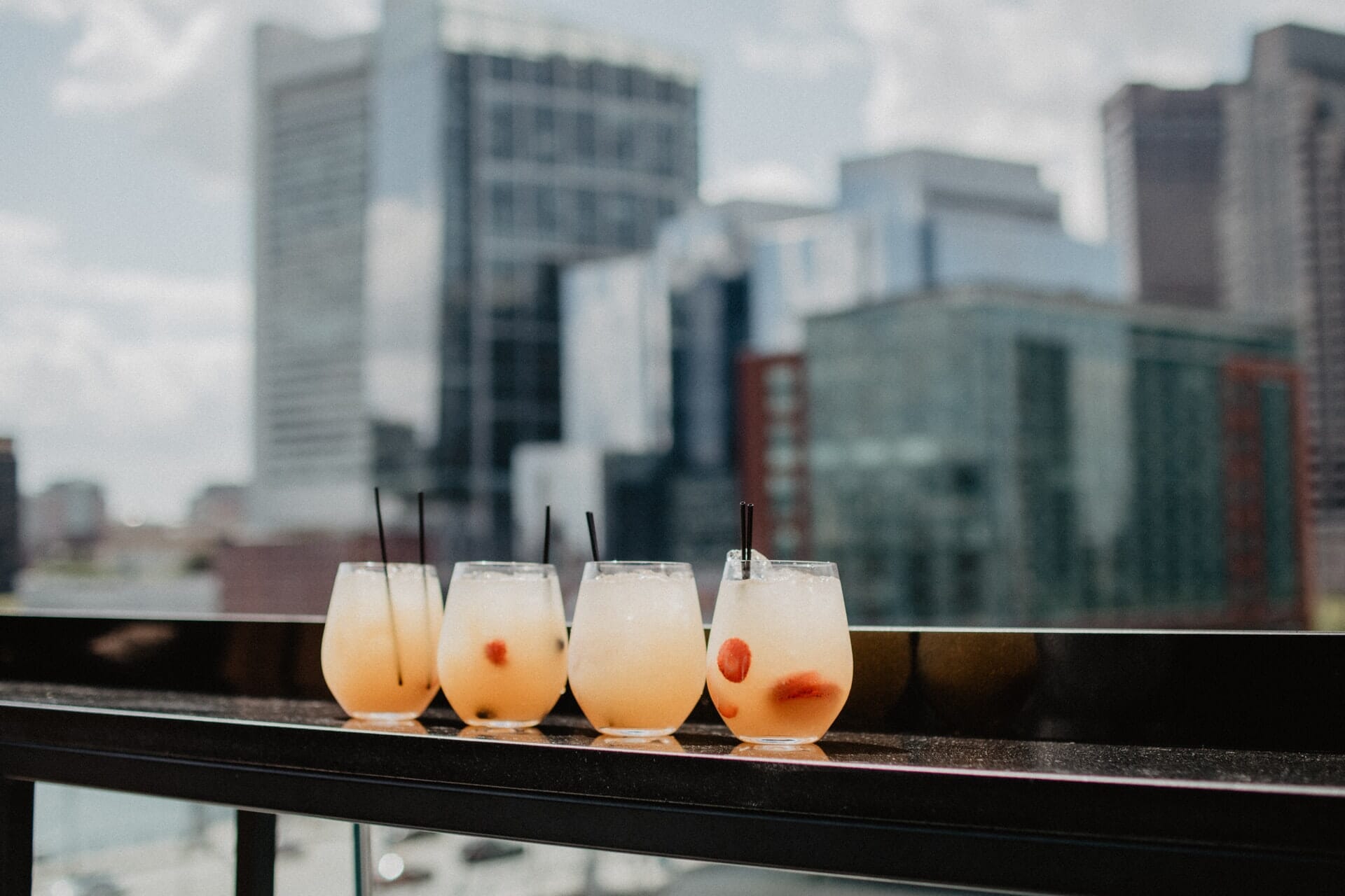 Cocktails at Lookout Rooftop with views of Downtown Boston