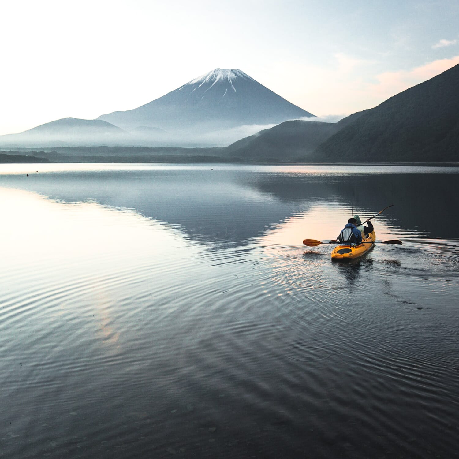 Kayakers on Lake Motosu with a Mt. Fuji backdrop