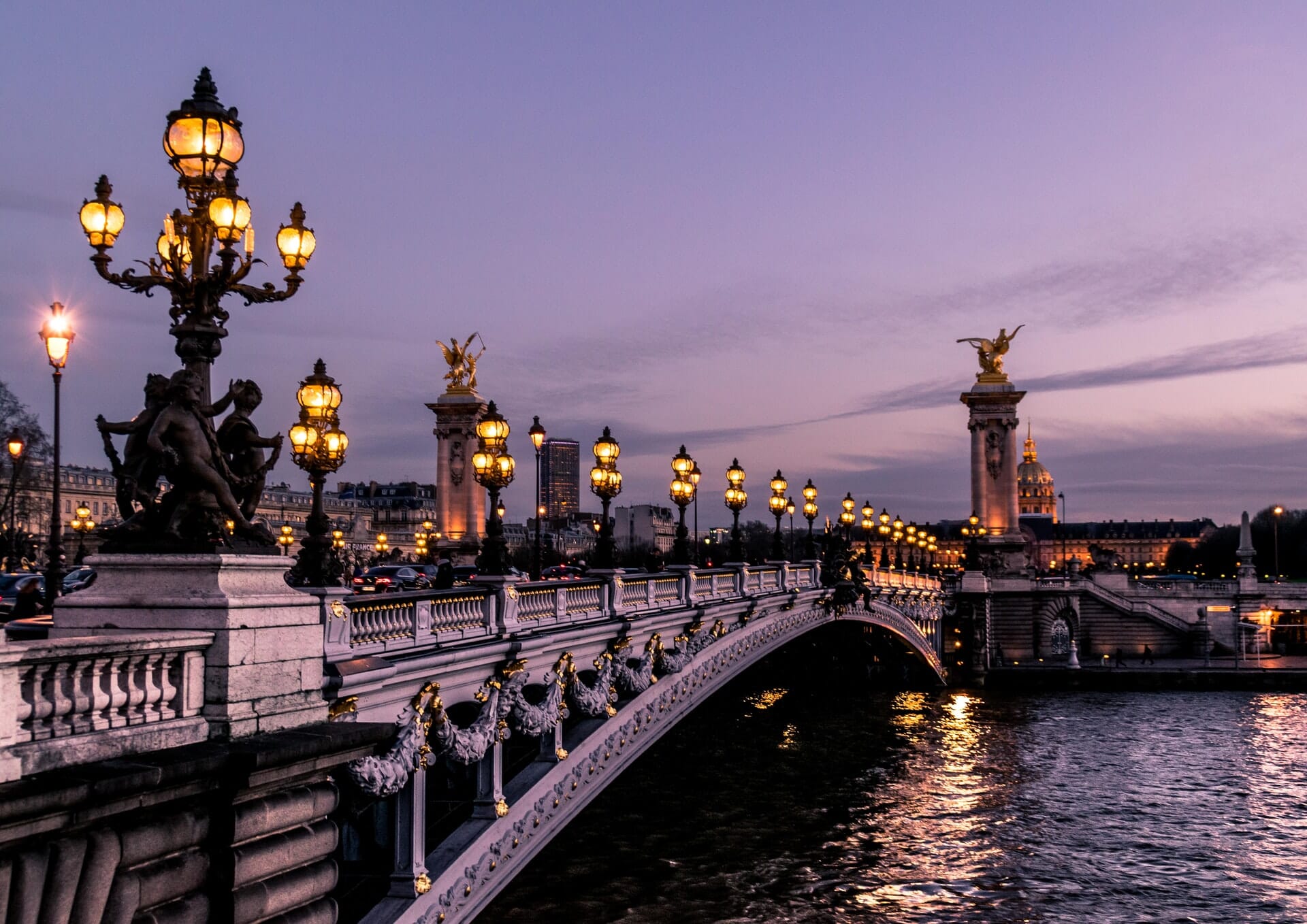 A bridge crossing the river in Paris