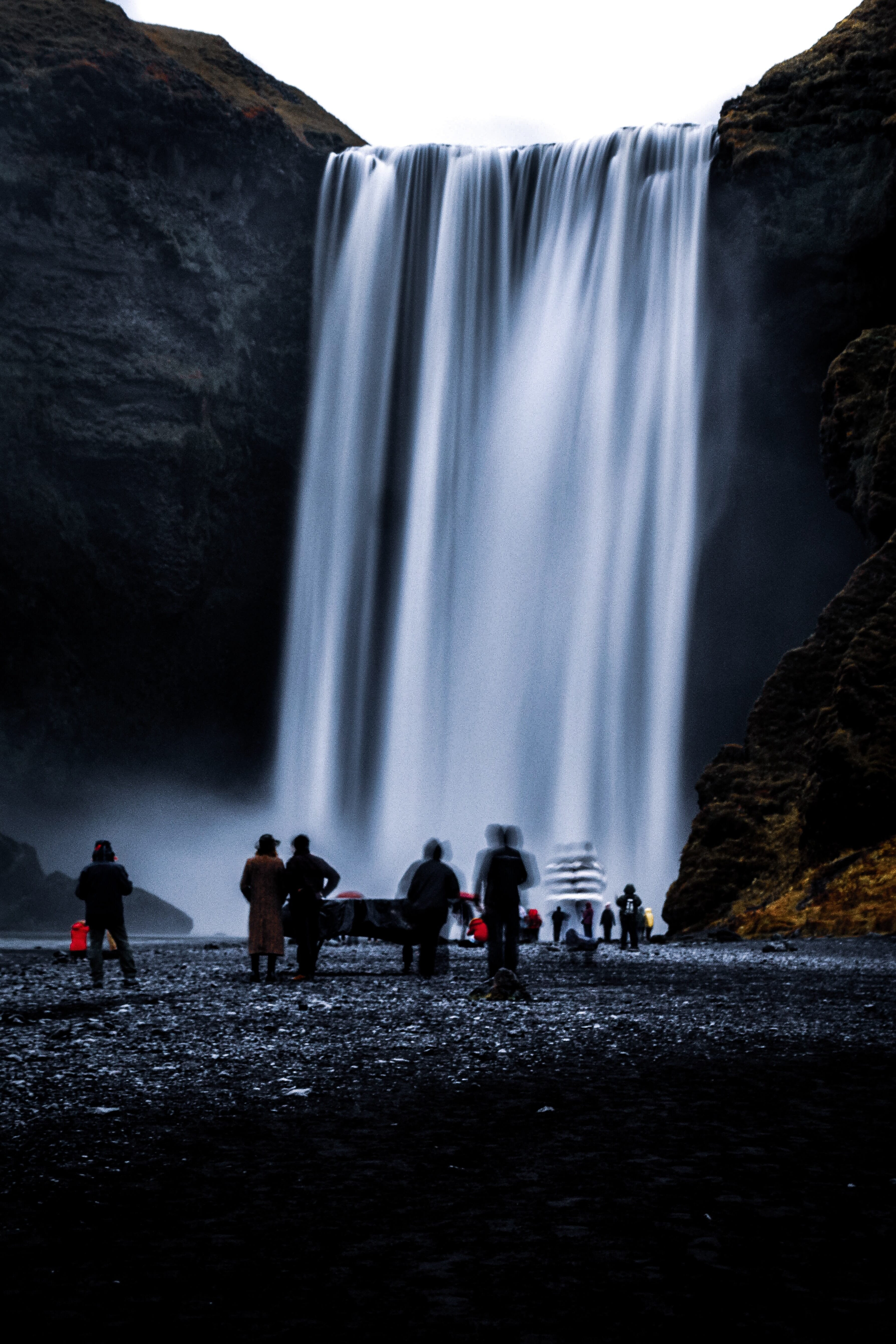 People movement by waterfall long exposure HDR photo