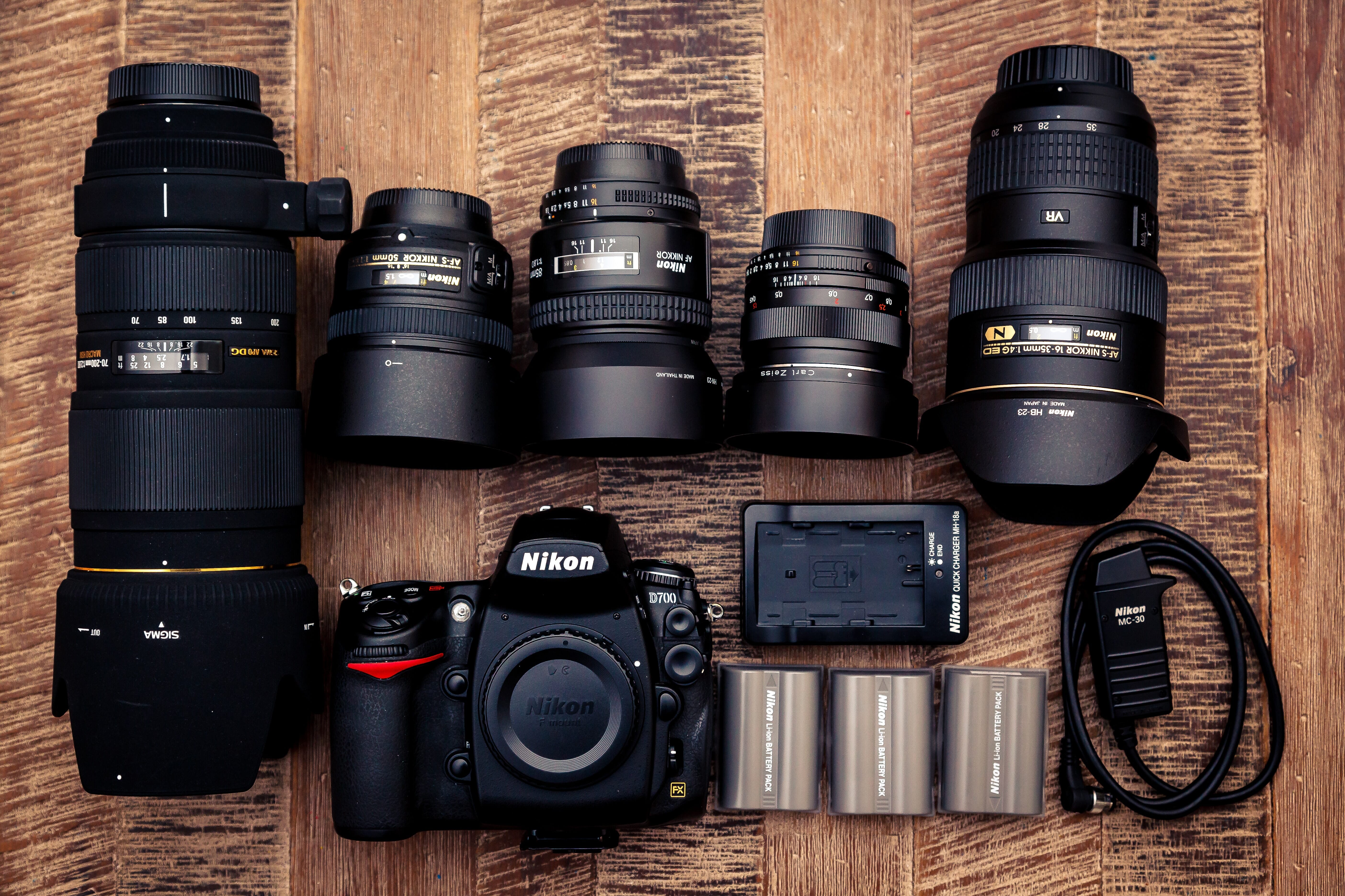 cameras and lenses laid out on a table