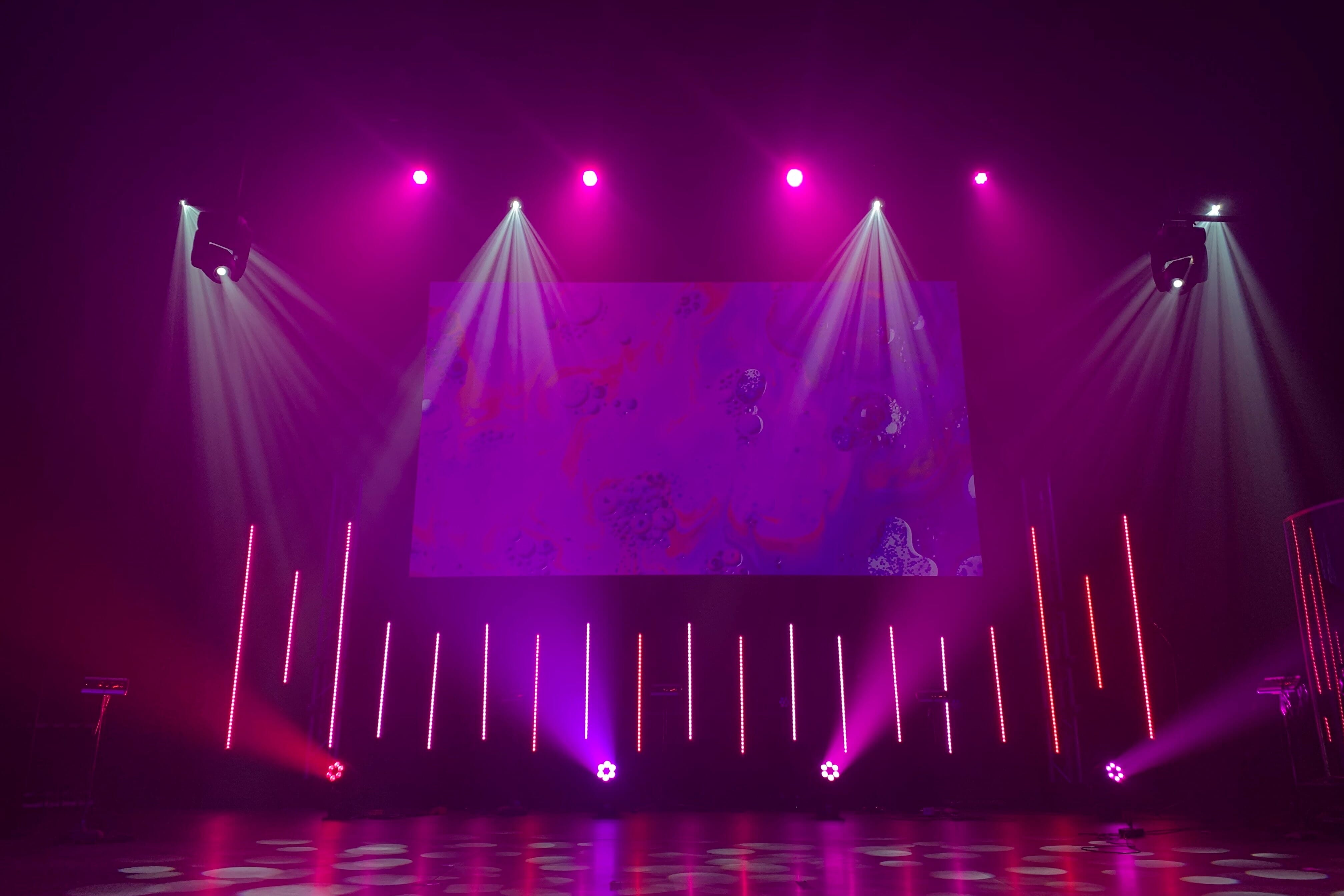 event photography tips stage with dramatic lighting