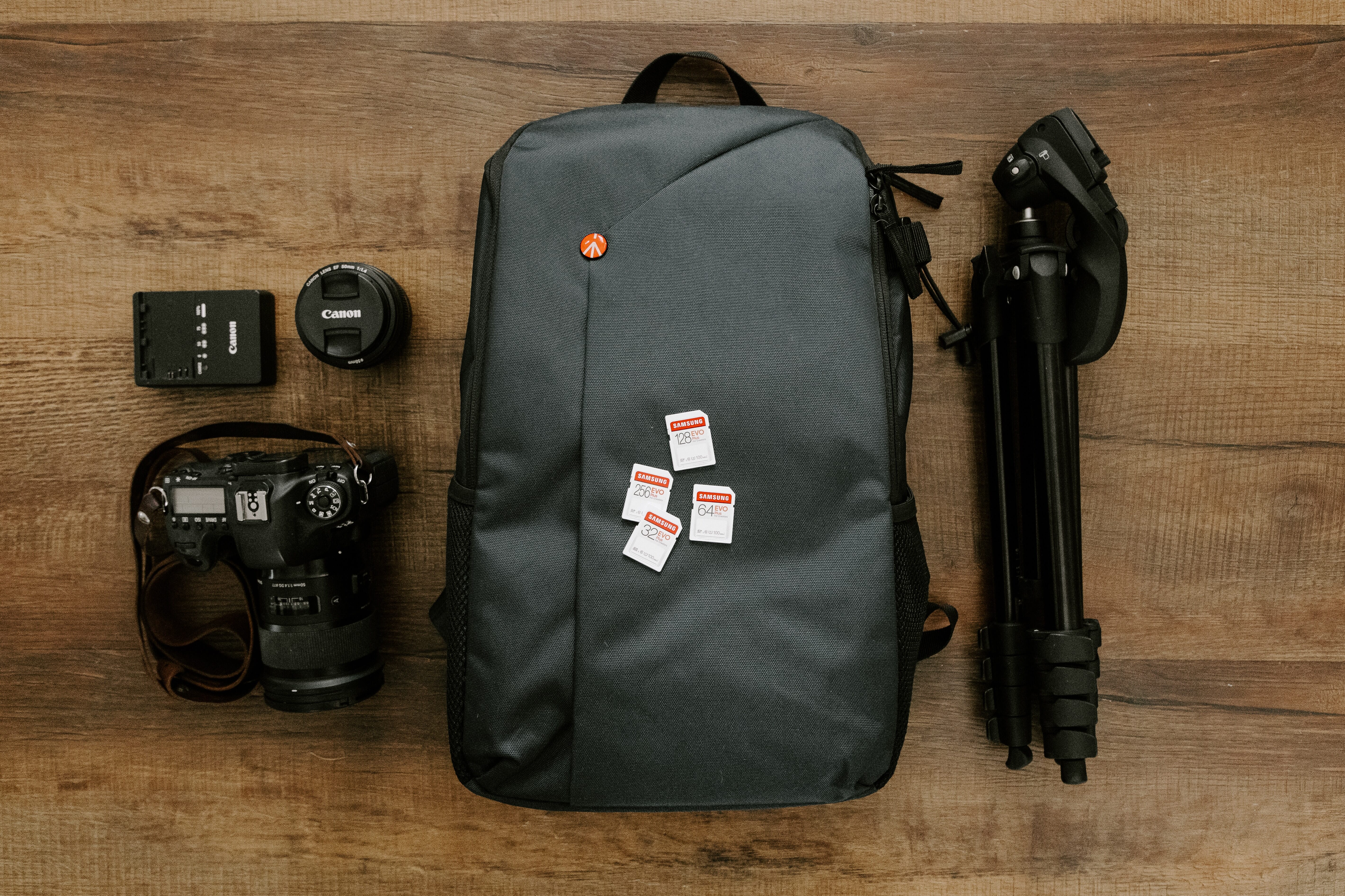 kit bag with memory cards and tripod