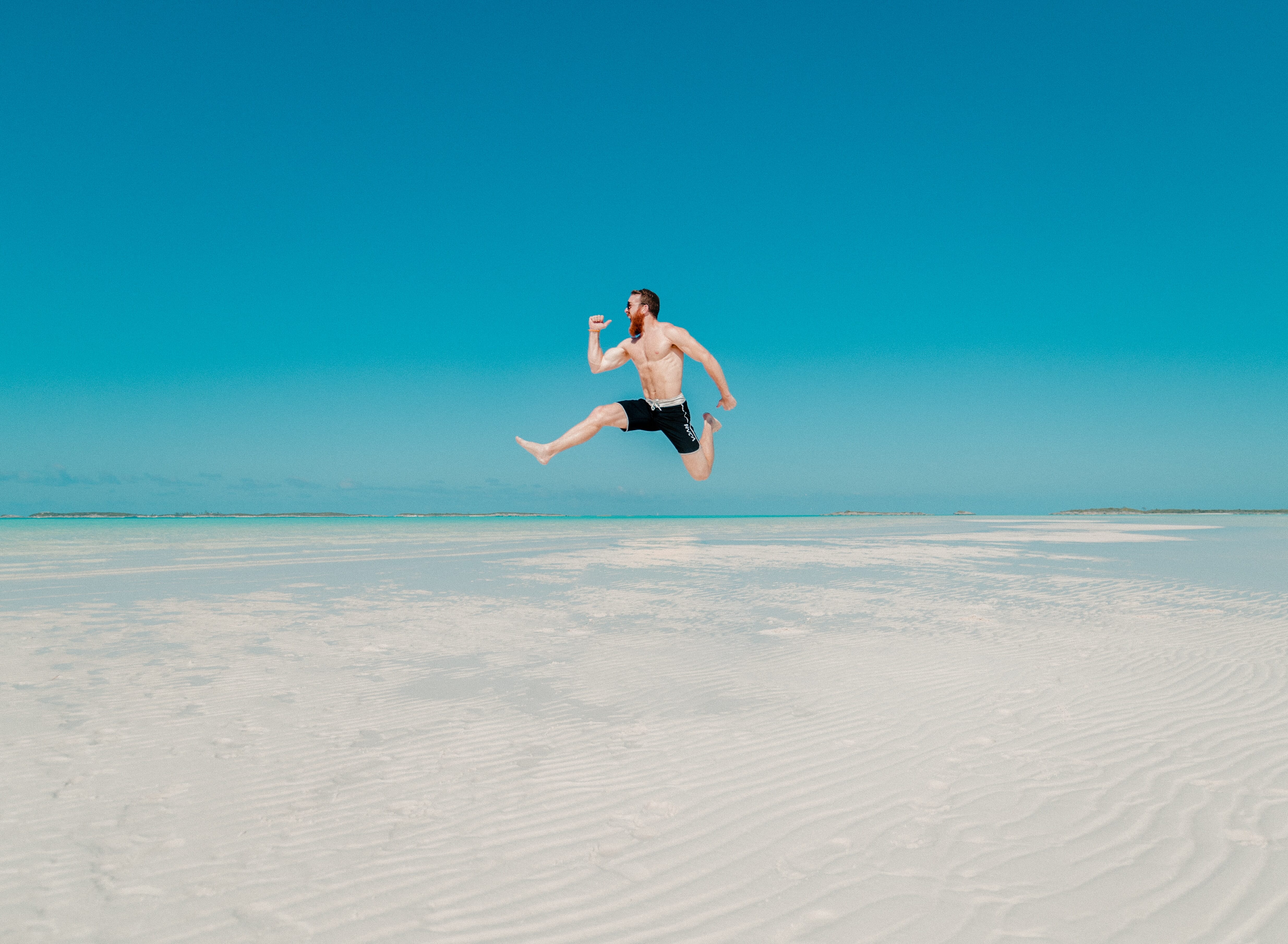 Sometimes, you don't need to go through all the fuss of building a composite in Photoshop to create a pseudo-levitation photo. This photographer likely instructed the model to jump, then used a fast shutter speed to create a crisp exposure while he was airbound.