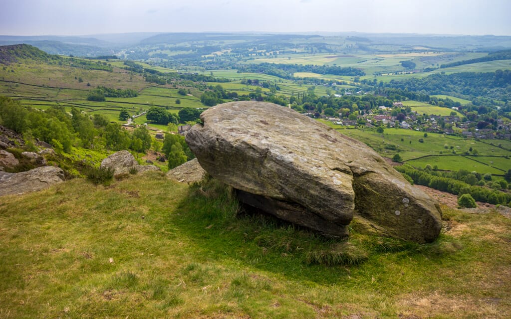  The main subject i.e. the rock, uses the rule of thirds for positioning 