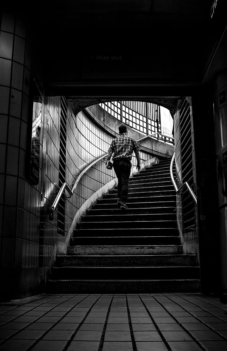 person walking up stairs