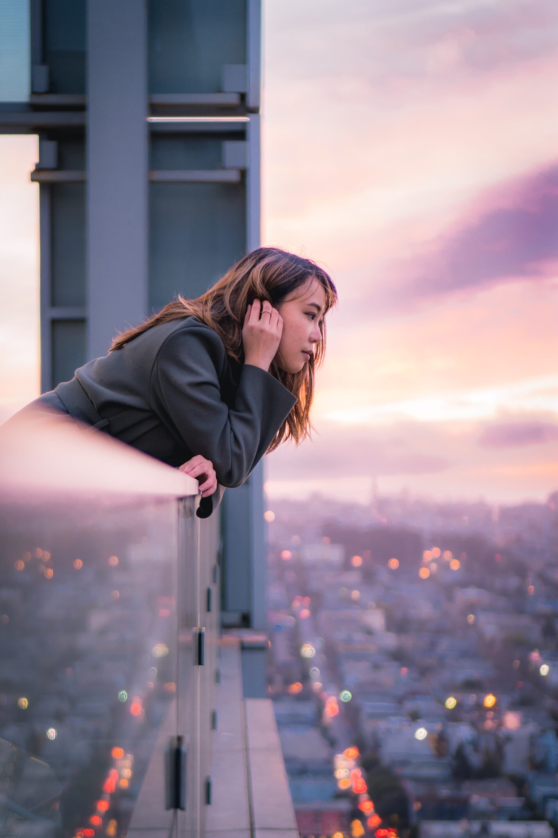 Try unique perspectives like leaning over an apartment balcony overlooking the city