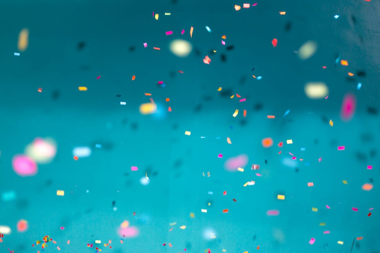 Colorful confetti with only a narrow plane in focus, the rest dissolving into bokeh at f/1.8