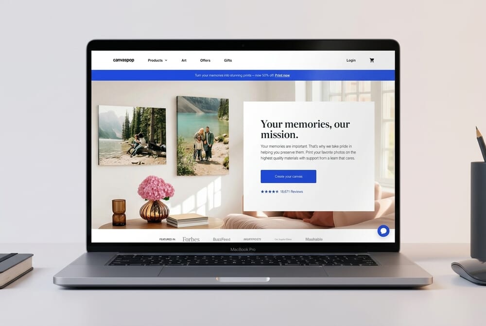 Canvaspop website showing framed canvas options and design tools