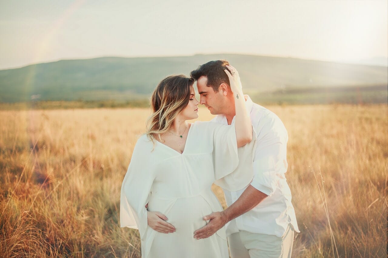maternity portrait in a field